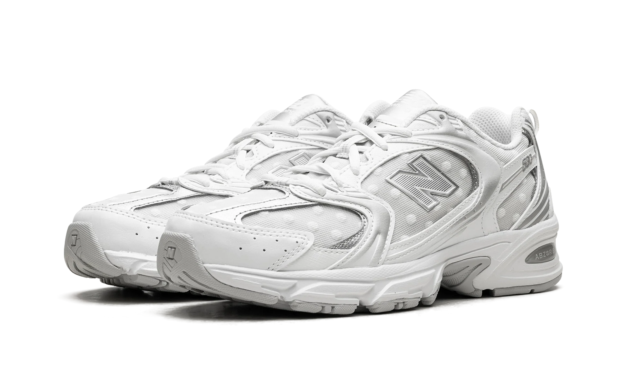 NB 530 – "Silver Metallic Polka Dots"