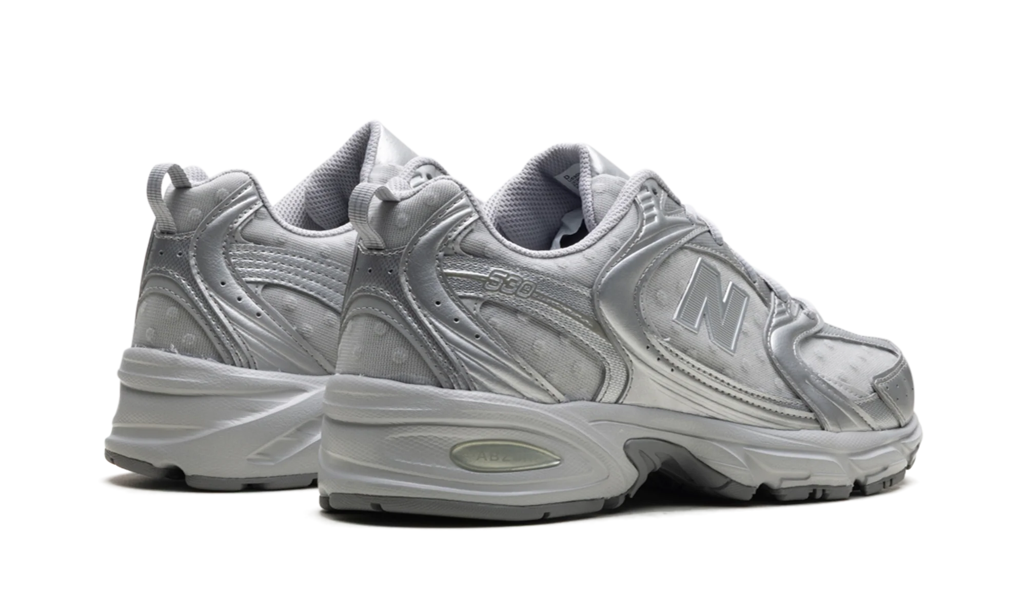 NB 530 – "Silver Metallic Raincloud Polka Dots"